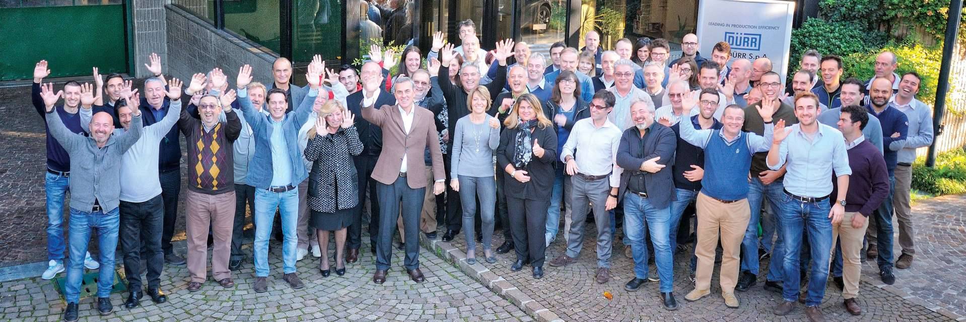 Olpidürr and employees group picture to celebrate their motto